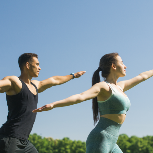 man-woman-practicing-yoga-outdoor(1)
