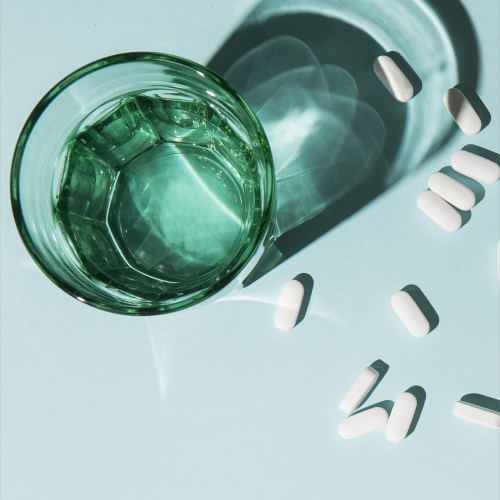 top-view-medicine-with-water-glass-table(2)